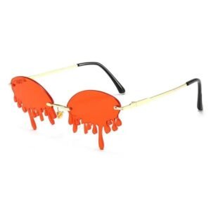 lunettes de soleil forme larme steampunk or avec verres rouges 612 1